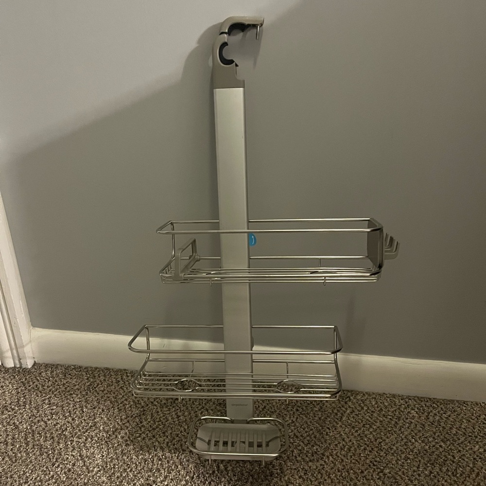 Simple human adjustable shower caddy